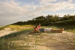 Couple lazing on beach